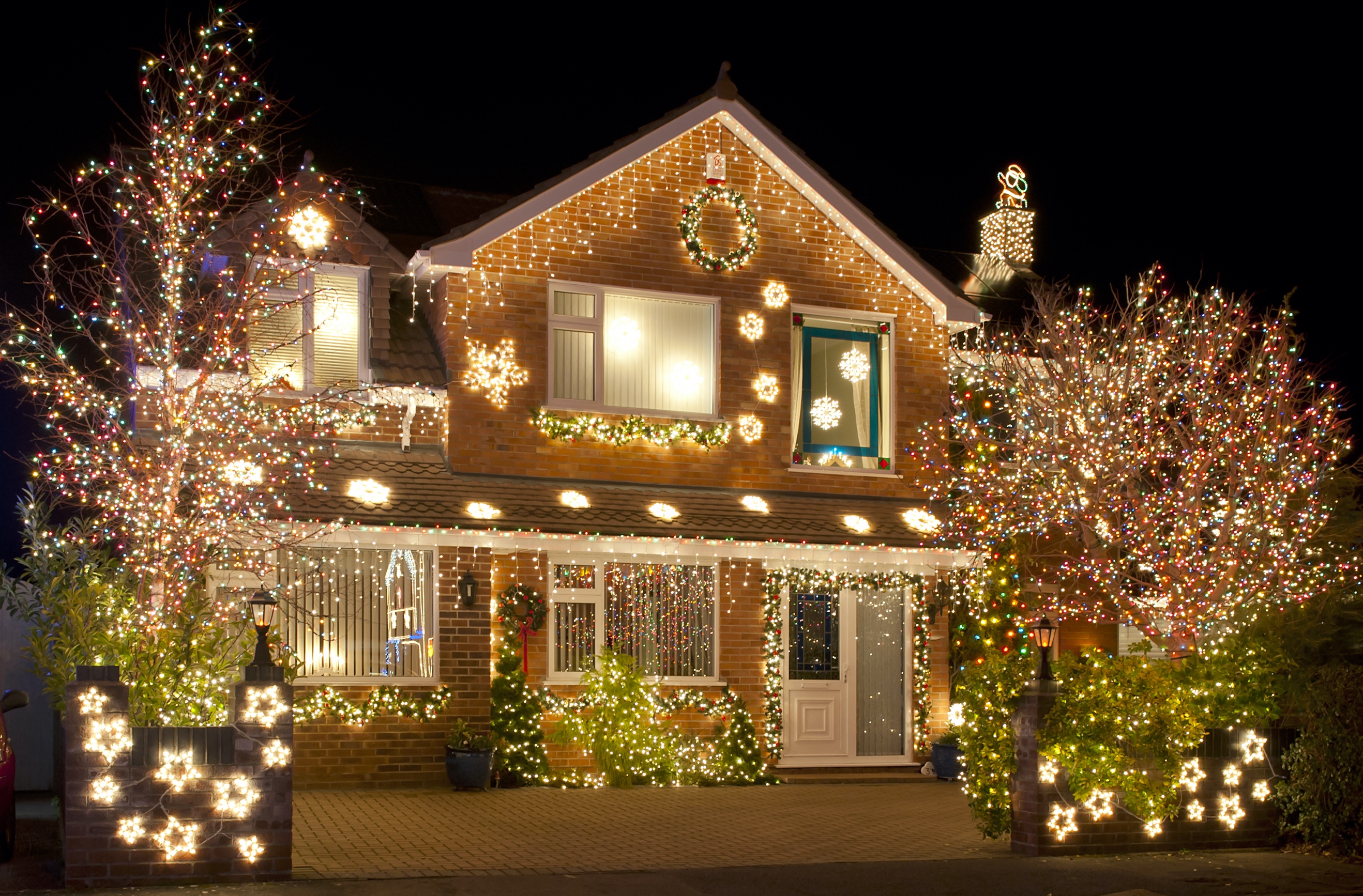 Christmas lights installed by a roofing company